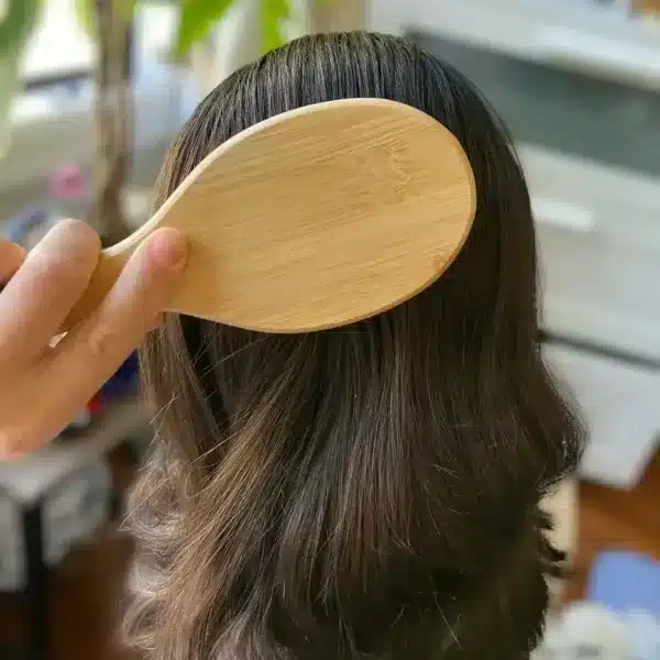 back of bamboo paddle brush