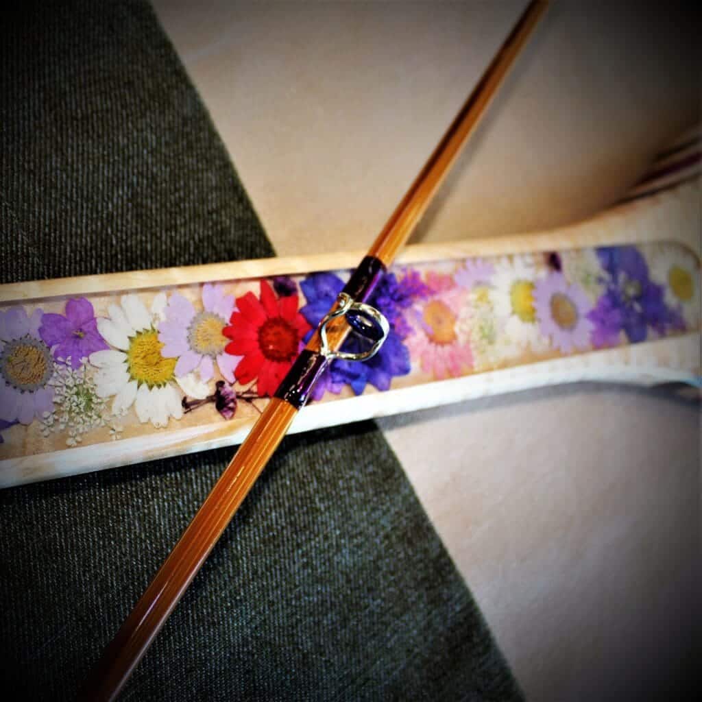 Purple accent bamboo fly rod and dried flower inlaid landing net