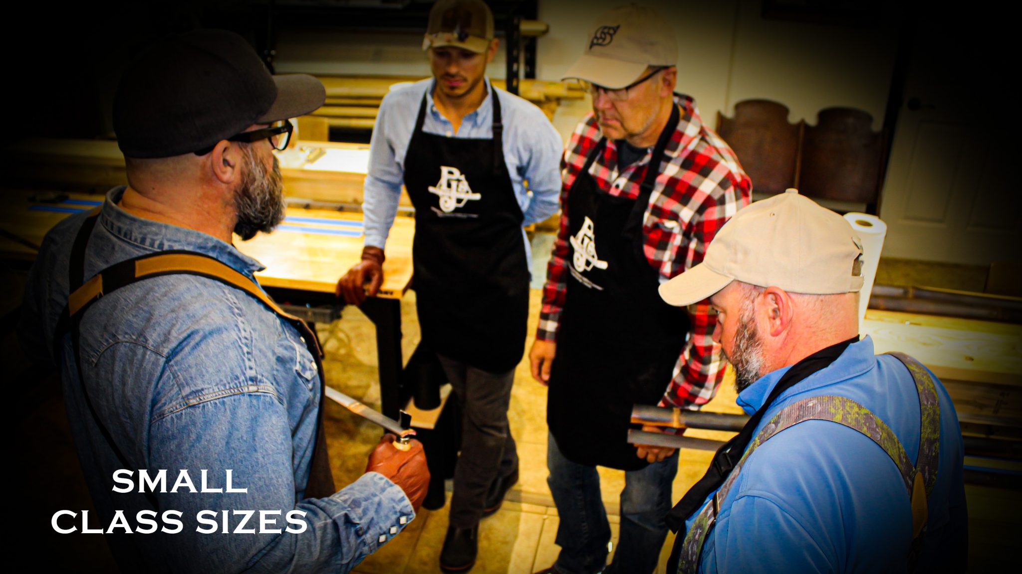 Teacher holding a rod with onlooking students